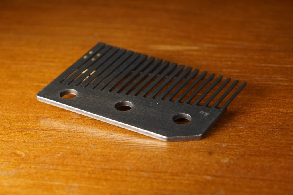 The front side of the tuning weight of Muro Box-N40 comb (vibration plate)
