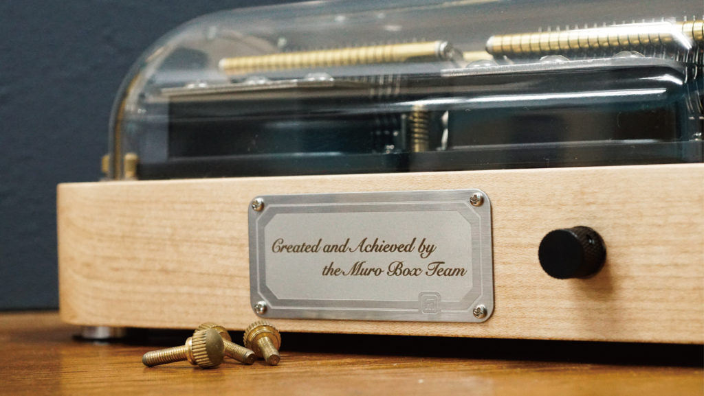 Joeri's custom-engraved text on his N40 music box is "Created and Achieved by the Muro Box Team" because he believes the creation of this music box is a testament to the hard work and dedication of our team.