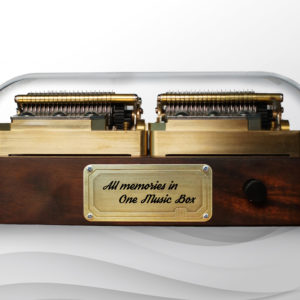 The front side of Muro Box-N40 Sublime music box shows a metal plate for adding customized engraving content and a knob for selecting songs to play offline.