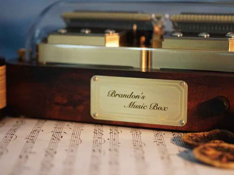 Close-up photo of Brandon’s customized engraving on the Muro Box-N40 Sublime music box.
