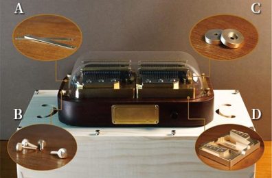 Muro Box-N40 Sublime music box and a pinewood unpainted resonance box, where the brass components in the music box mechanism are marked as A, B, C, and D.